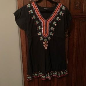 Kikisol fun and flirty embellished black dress